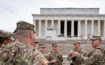 U.S. Army Maj. Gen. Thomas Friloux visits with Soldiers while they provide a presence patrol at the National Mall