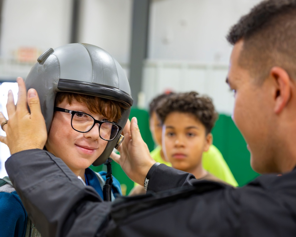Future Aviators Try on Pilot Gear During F-22 Team Visit at Wallkill Boys &amp; Girls Club