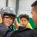 Future Aviators Try on Pilot Gear During F-22 Team Visit at Wallkill Boys &amp; Girls Club