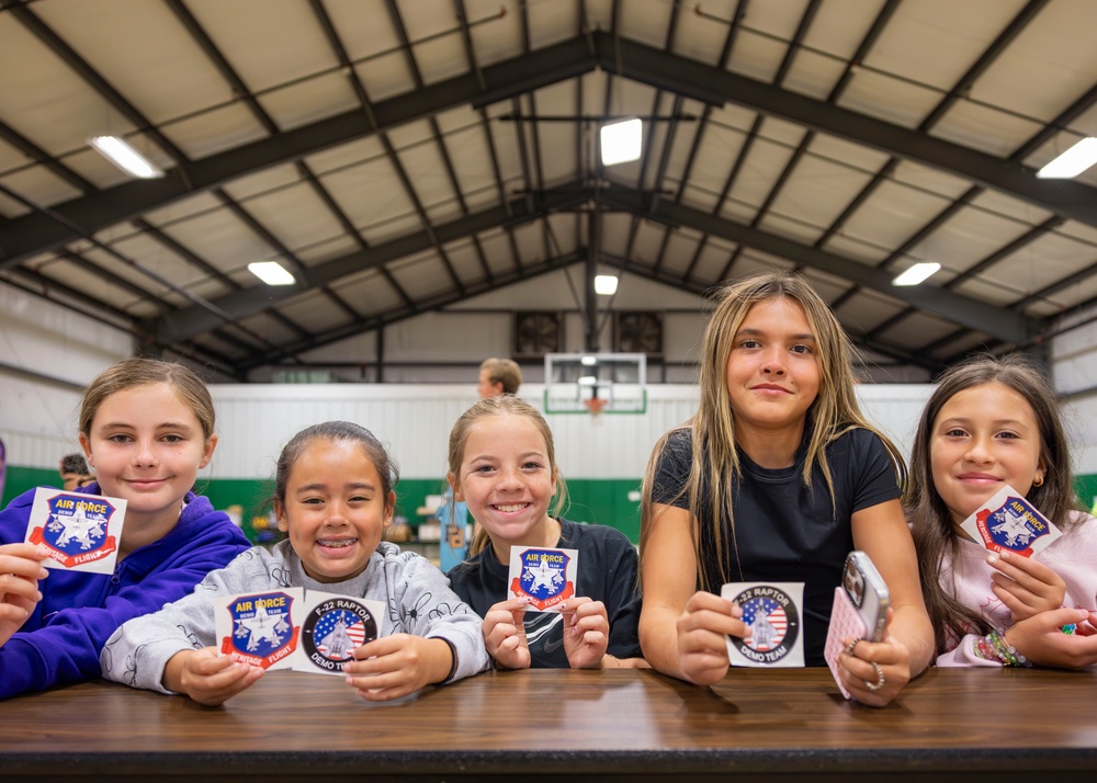 Future Aviators Try on Pilot Gear During F-22 Team Visit at Wallkill Boys &amp; Girls Club