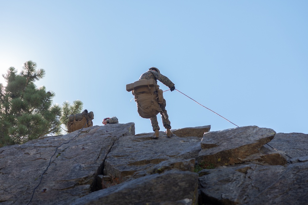 1st Bn., 5th Marines rappel from a mountain during MTX 4-25