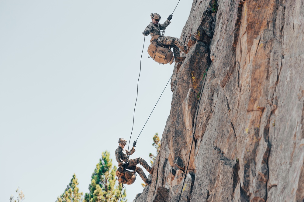 1st Bn., 5th Marines rappel from a mountain during MTX 4-25