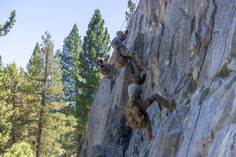 1st Bn., 5th Marines rappel from a mountain during MTX 4-25