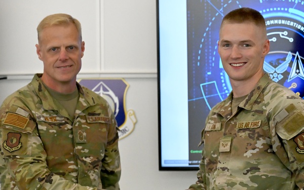 AFLCMC Command Chief coins airmen for excellence during Hanscom visit