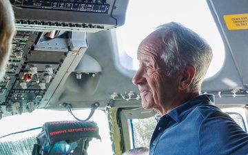 POW Survivor Capt. Paul Granger (Ret.) tours a C-17 at Edwards