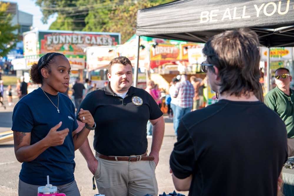 Navy Recruiters Speak With Attendee