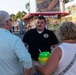 Navy Recruiter Speaks With Attendee