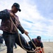STG3 Abalos Axleross and STGSN  Nathan Antepara secure and stow the pilot ladder during sea-and-anchor evolution