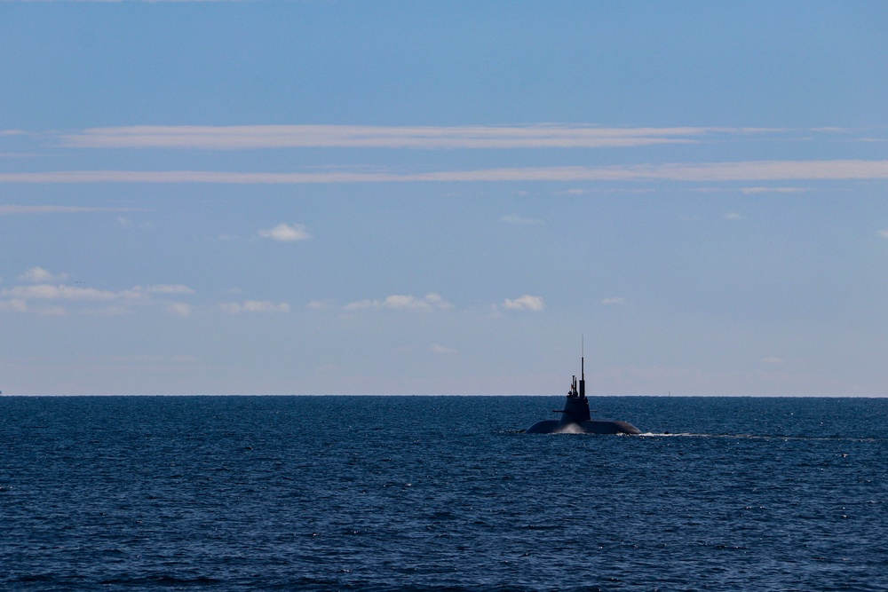 USS Bulkeley (DDG 84) maneuvers alongside the German Type 212A (U-34) diesel-electric attack submarine during exercise Northern Coasts 2025