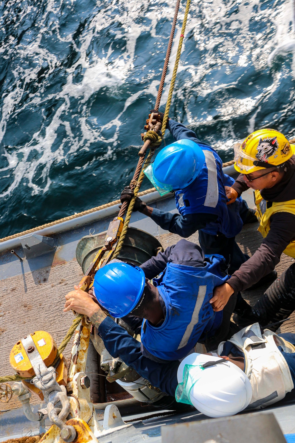 USS Bulkeley (DDG 84) Sailors rig the high tension line while conducting a replenishment-at-sea during exercise Northern Coasts 2025