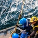 USS Bulkeley (DDG 84) Sailors rig the high tension line while conducting a replenishment-at-sea during exercise Northern Coasts 2025