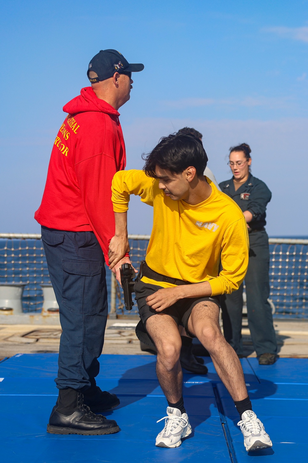 USS Bulkeley (DDG 84) Sailors conduct non-lethal weapons training and gun grab defense and retention techniques during exercise Northern Coasts 2025