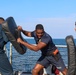 CTT1 Darren Grant and GM3 Daniel Kininmonth conduct non-lethal weapons training during exercise Northern Coasts 2025