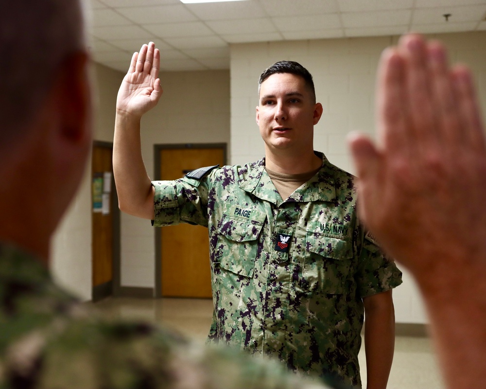 MU1 Jason Paige reenlists for four more years