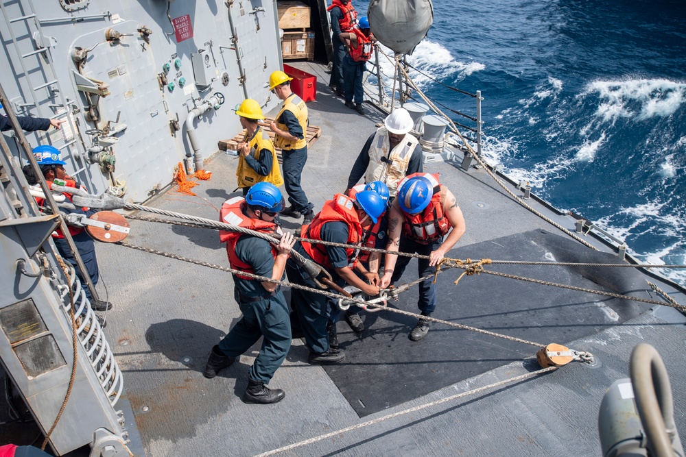 USS Higbee Sailors Conduct Replenishment-at-Sea with USNS John Lewis