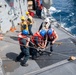 USS Higbee Sailors Conduct Replenishment-at-Sea with USNS John Lewis