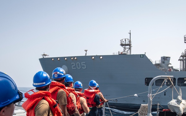 USS Higbee Sailors Conduct Replenishment-at-Sea with USNS John Lewis