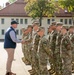 U.S. Ambassador to NATO Whitaker shakes hands with Task Force Iron Soldiers in Poland