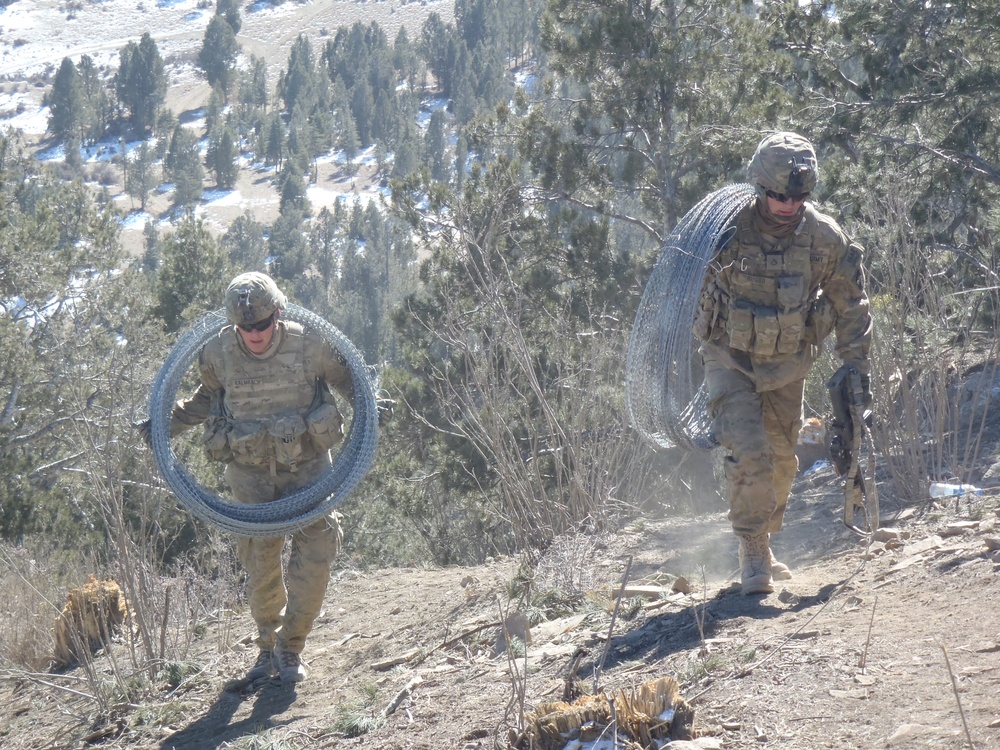 Soldiers carrying C-wire