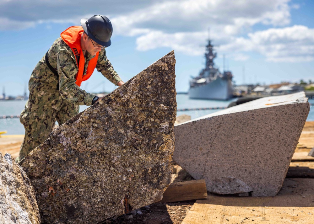 U.S. Navy removes concrete segments from USS Arizona mooring platforms