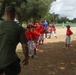 HMH-462 Marines play baseball with local youth team