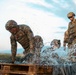 Mud, Muscle, and Multinational Might: German-Led 'Saulauf' Challenges NATO Troops and Builds Camaraderie
