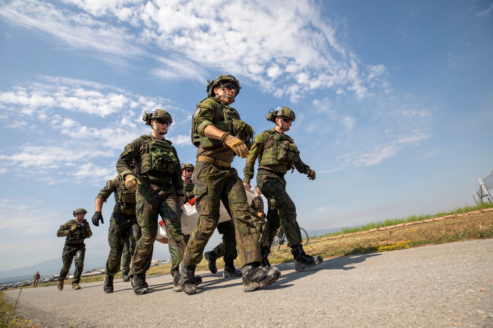 Mud, Muscle, and Multinational Might: German-Led 'Saulauf' Challenges NATO Troops and Builds Camaraderie