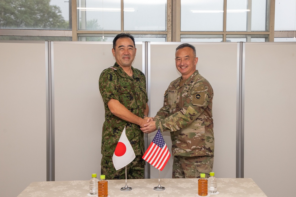 Lt. Gen. Makoto Sato, commanding general of the Japan Ground Self-Defense Force Middle Army 3rd Division, visited Brig. Gen. James K. Dooghan, commanding general of U.S. Army Japan, during Orient Shield 25 at Sekiyama Training Area, Sept. 18.