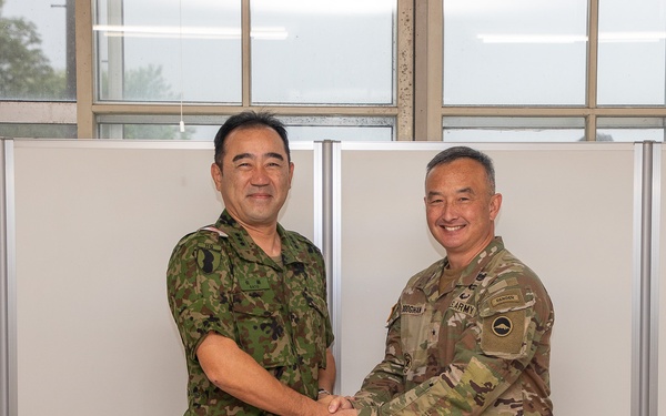 Lt. Gen. Makoto Sato, commanding general of the Japan Ground Self-Defense Force Middle Army 3rd Division, visited Brig. Gen. James K. Dooghan, commanding general of U.S. Army Japan, during Orient Shield 25 at Sekiyama Training Area, Sept. 18.
