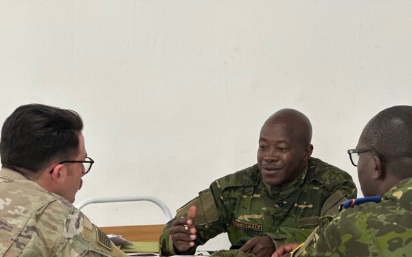SETAF-AF civil affairs noncommissioned officer translates French for his team in West Africa
