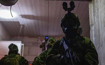 Czech Armed Forces provide security for U.S. Army Soldiers while exiting an underground tunnel
