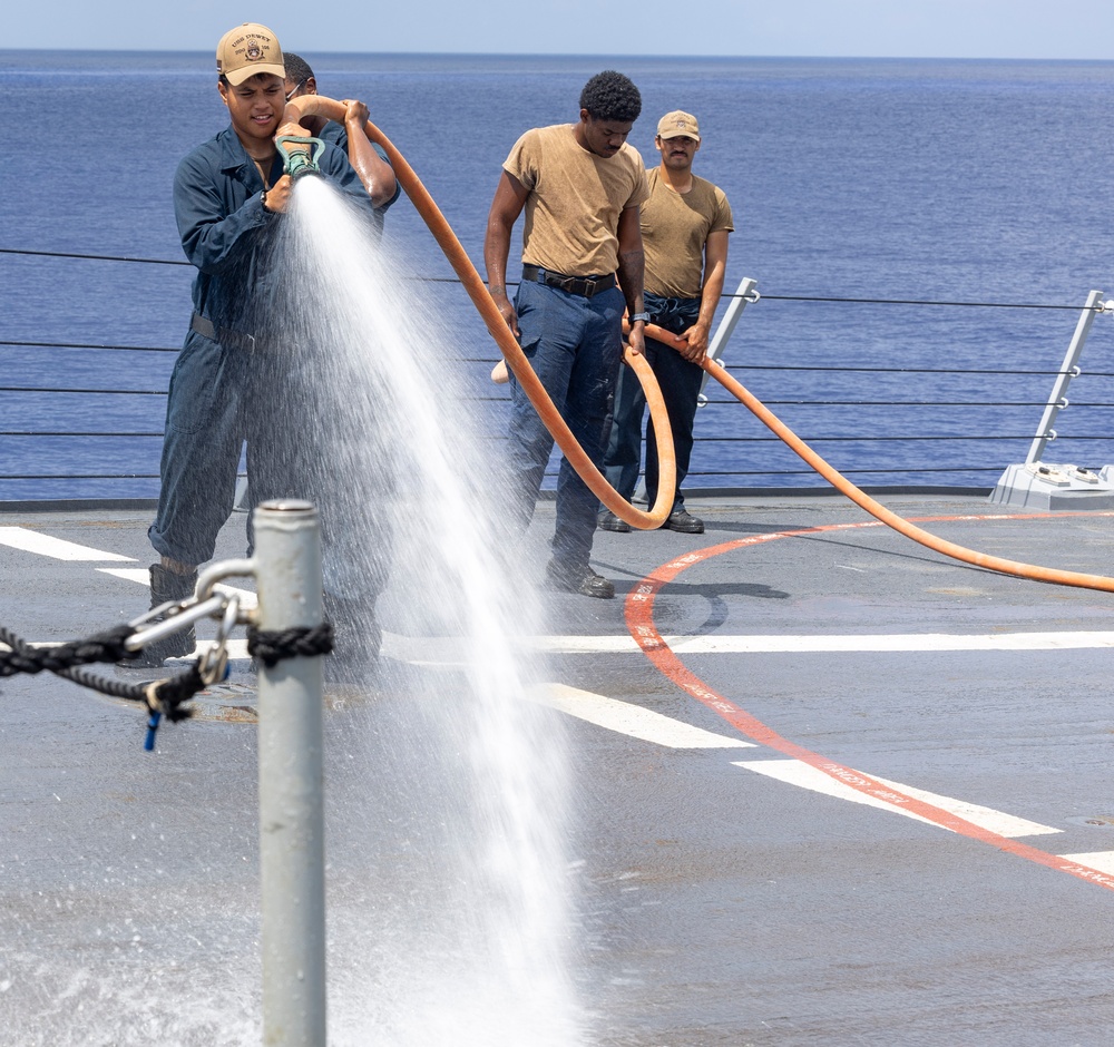 Sailors aboard the USS Dewey conduct a Freshwater Wash-Down
