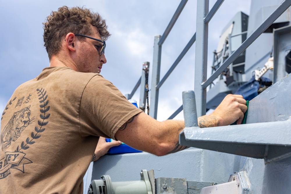 Sailors aboard the USS Dewey conduct a Freshwater Wash-Down