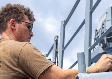Sailors aboard the USS Dewey conduct a Freshwater Wash-Down