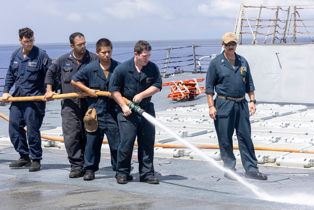 Sailors aboard the USS Dewey conduct a Freshwater Wash-Down