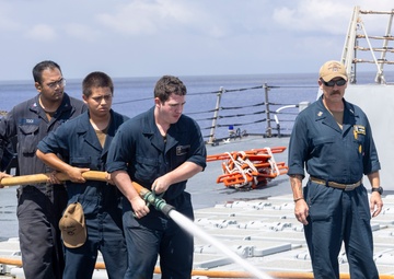 Sailors aboard the USS Dewey conduct a Freshwater Wash-Down