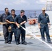 Sailors aboard the USS Dewey conduct a Freshwater Wash-Down