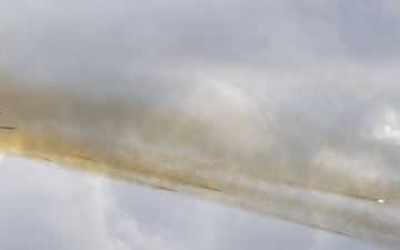 U.S. Army AH-64 Apache fires rockets during Iron Defender-25