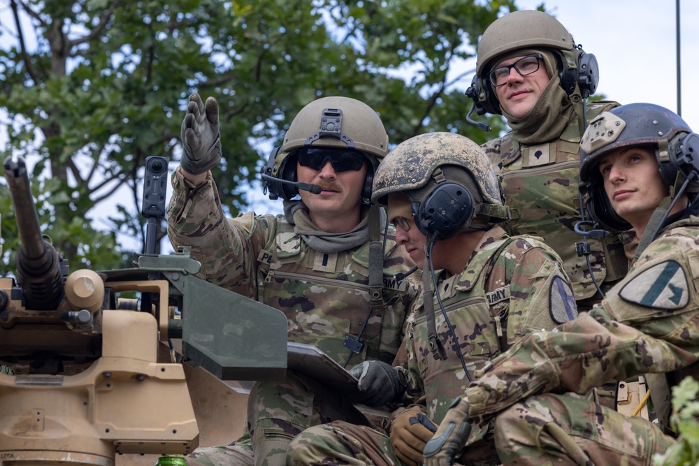 U.S. Soldiers prepare before Iron Defender-25