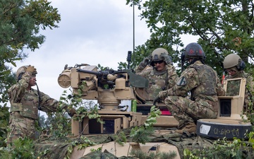U.S. Soldiers prepare an M1A2 Abrams tank before Iron Defender-25