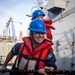 USS Hgbee Conducts Replenishment-at-Sea from the Midships