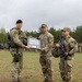 U.S. Army Soldiers presented a gift from the Lithuanian Land Forces
