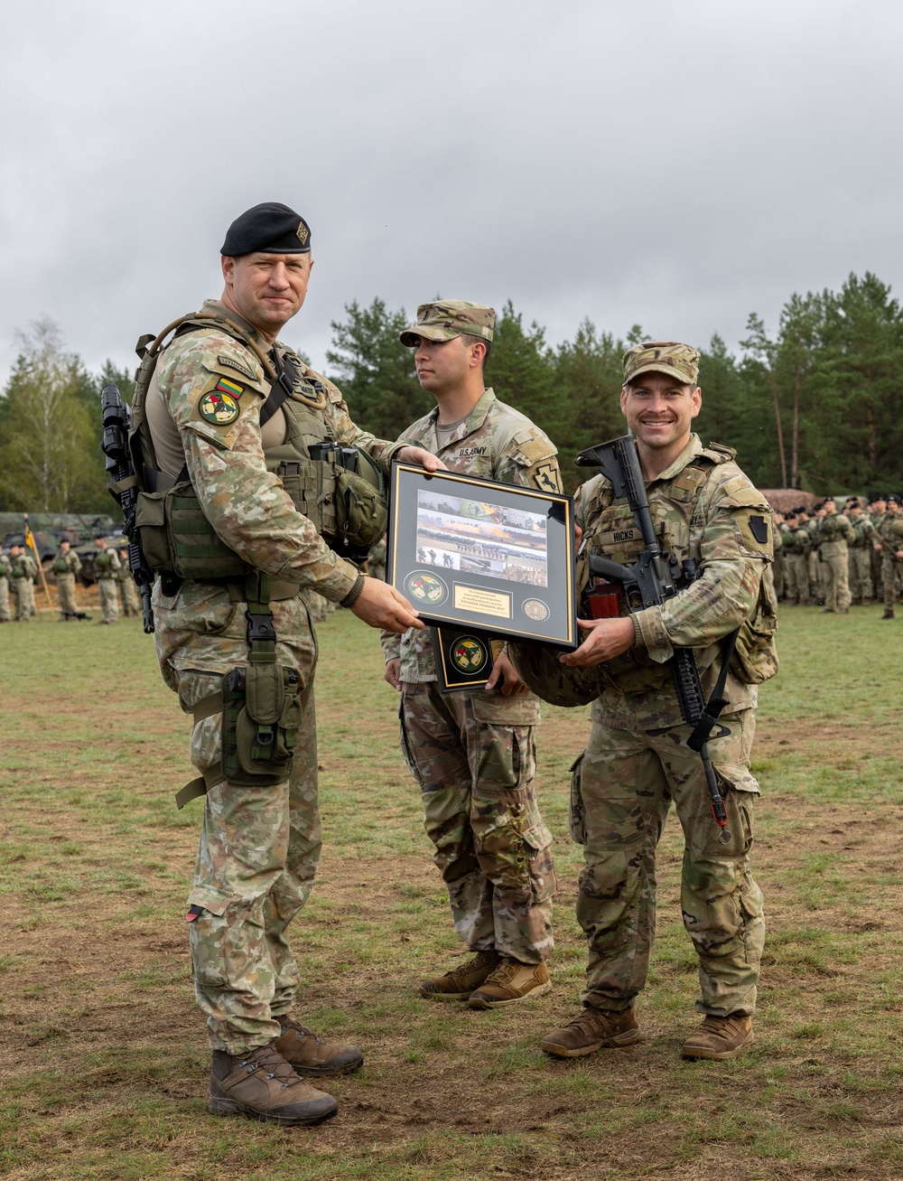 U.S. Army Soldiers presented a gift from the Lithuanian Land Forces