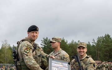 U.S. Army Soldiers presented a gift from the Lithuanian Land Forces