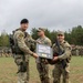 U.S. Army Soldiers presented a gift from the Lithuanian Land Forces