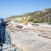 USS Mitscher (DDG 57) Sailor heaves mooring line