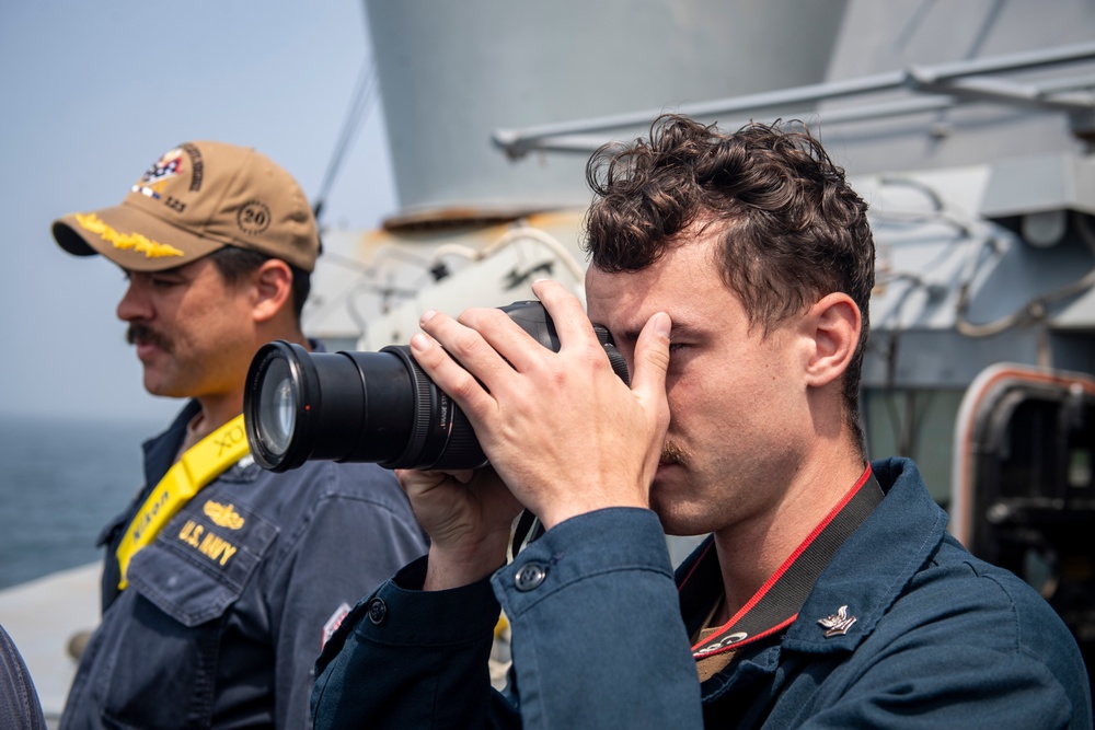 USS Higbee Sailors Gather Intel for Potential VBSS Interaction USS Higbee Sailors Gather Intel for Potential VBSS Interaction