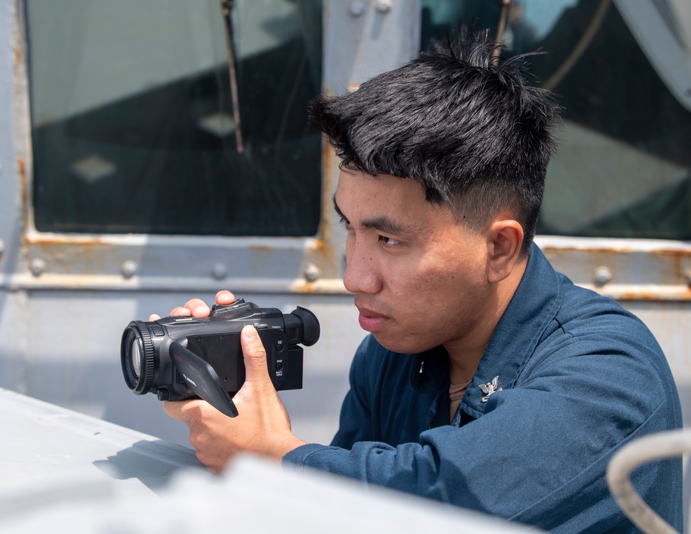 USS Higbee Sailors Gather Intel for Potential VBSS Interaction USS Higbee Sailors Gather Intel for Potential VBSS Interaction