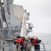 USS Higbee Sailors Conduct Maintenance on Davit