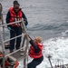 USS Higbee Sailors Conduct Maintenance on Davit